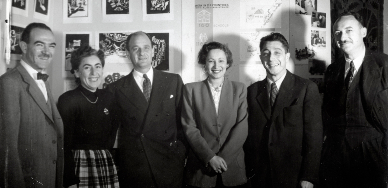 Left to right: Dr. Judah J. Shapiro (education and culture director), Blanche Bernstein (head of Budget and Research; Edward M. M. Warburg (Chairman); Kate Mendel (Belgium Director; Henry Levy (Czechoslovakia Director); and Moses Beckelmen (vice-chairman of European Headquarters) at JDC’s 1948 Conference on Jewish Relief and Rehabilitation in Paris